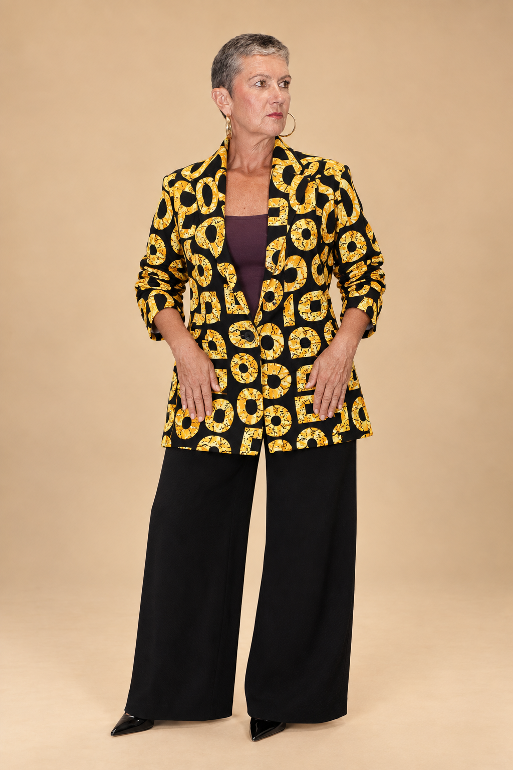 Blazer femme en wax noir et jaune Élégance graphique
